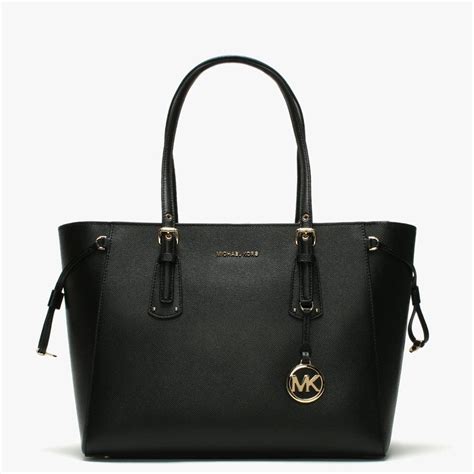 michael kors black white bag|michael kors black tote handbag.